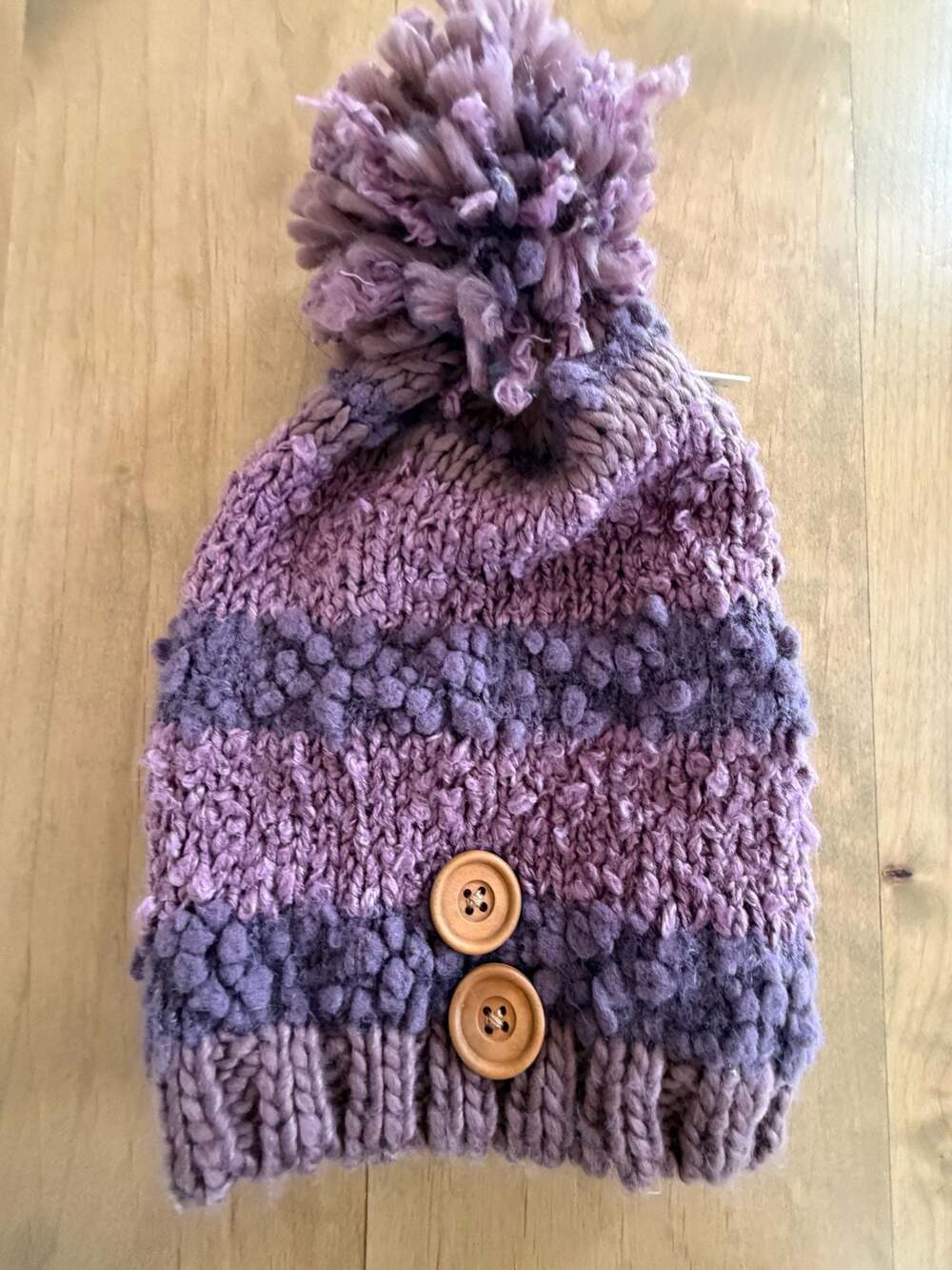 Simply Noelle Purple Striped Chunky Knit Pom Pom Beanie with Wood Buttons